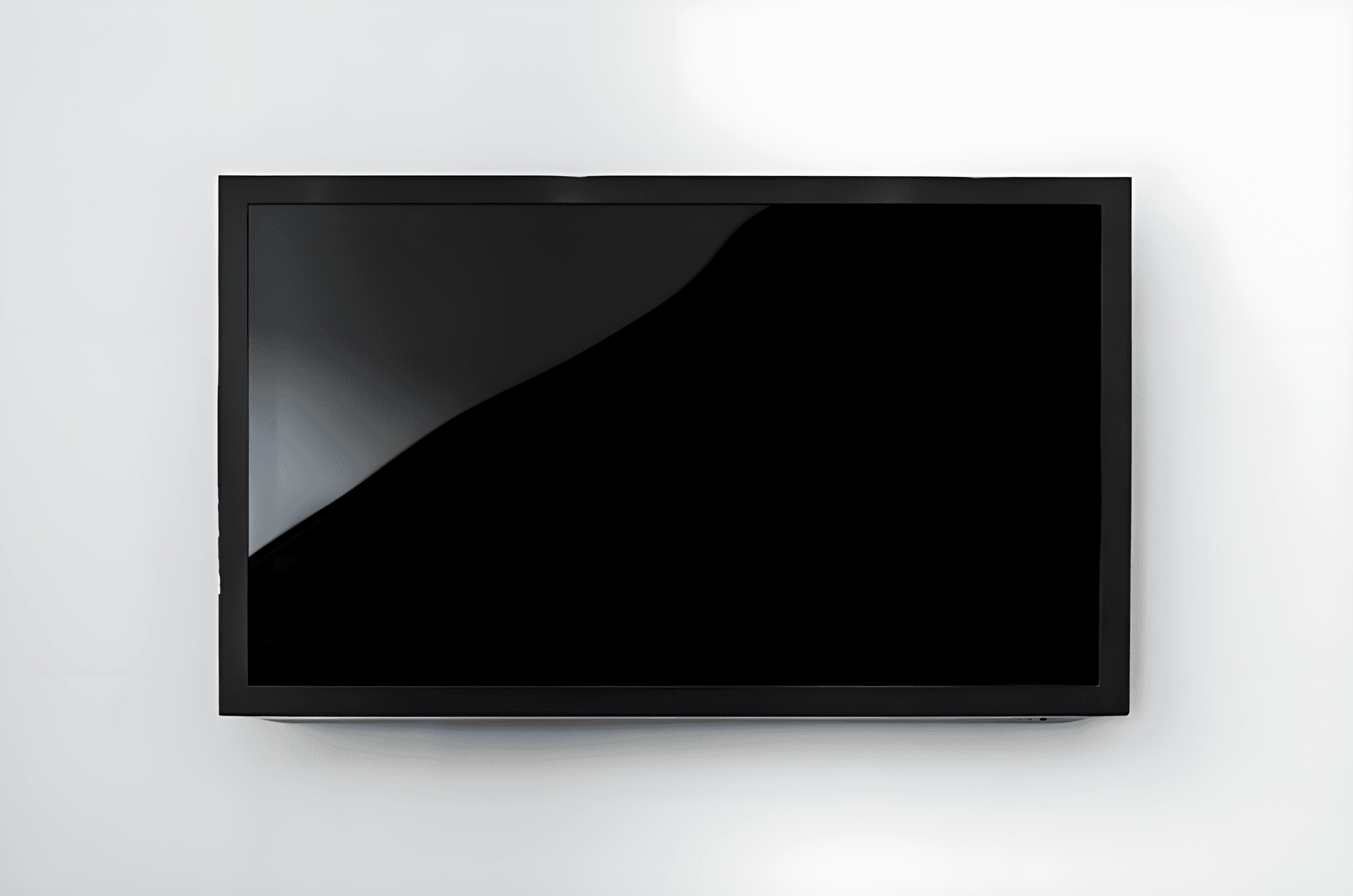 Wall-mounted LED TV with a slim black frame — TV rental for events and presentations