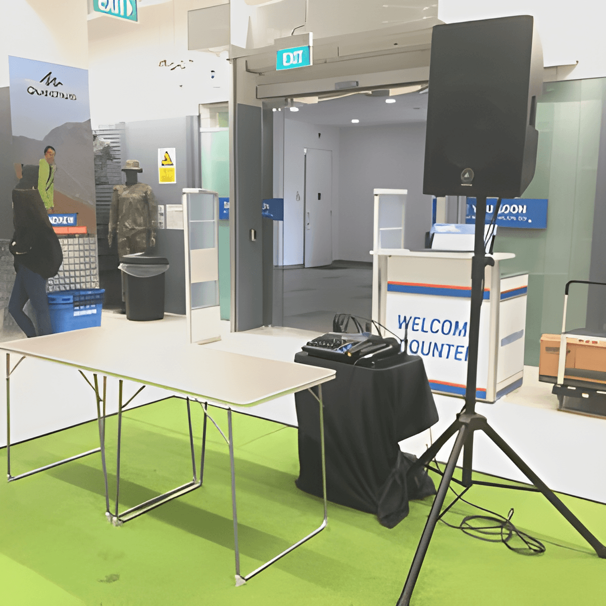 Speaker on a stand and mixer table set up for the Decathlon roadshow at Bedok, Singapore
